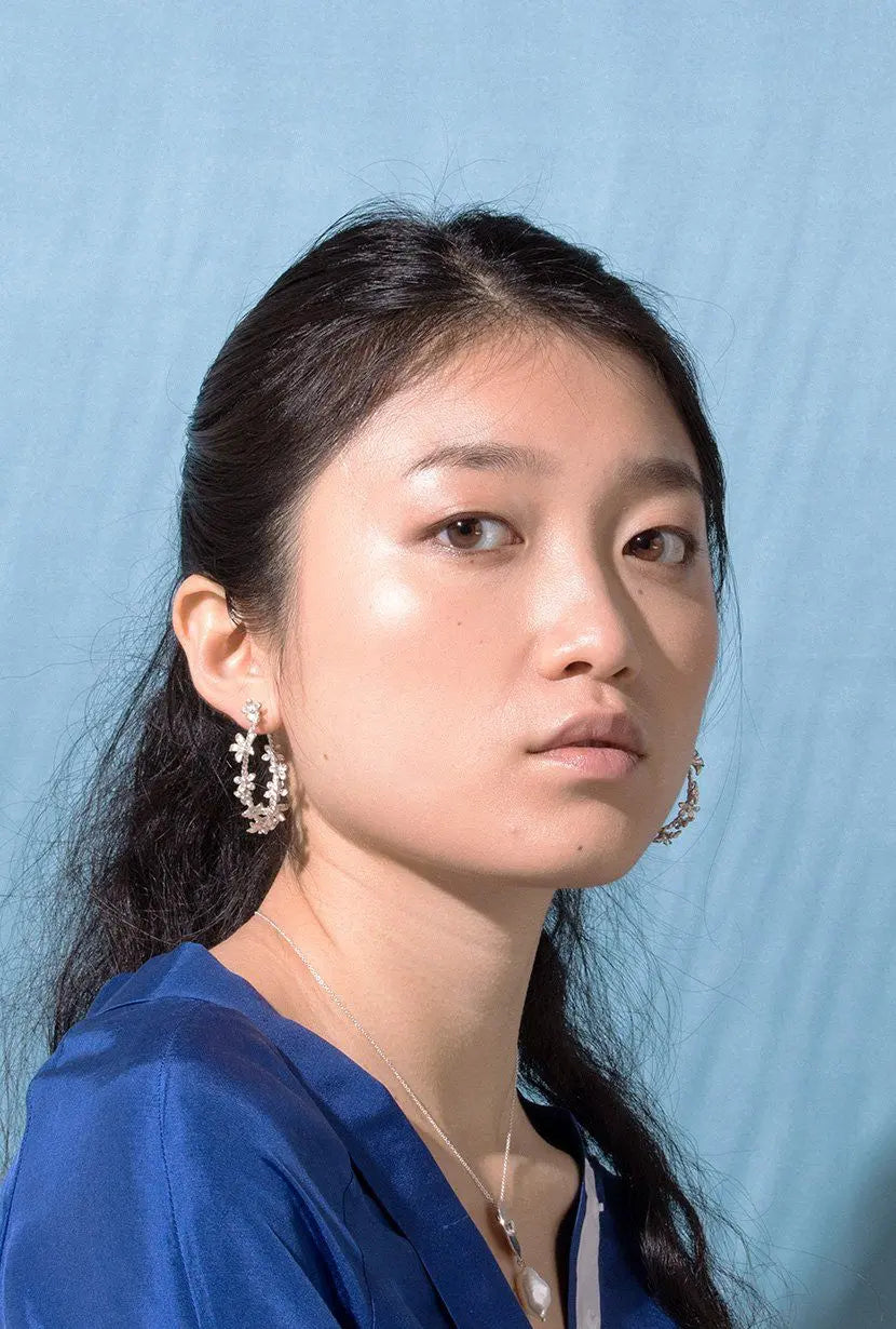 Sterling silver garland hoops worn by model