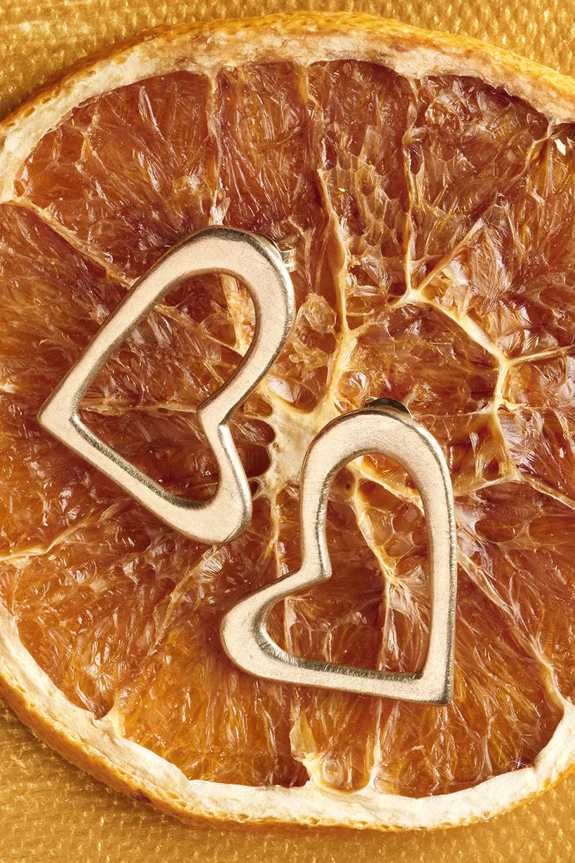 Heartline Earrings in 9ct recycled yellow gold – sculptural heart-shaped stud earrings, handmade in Australia