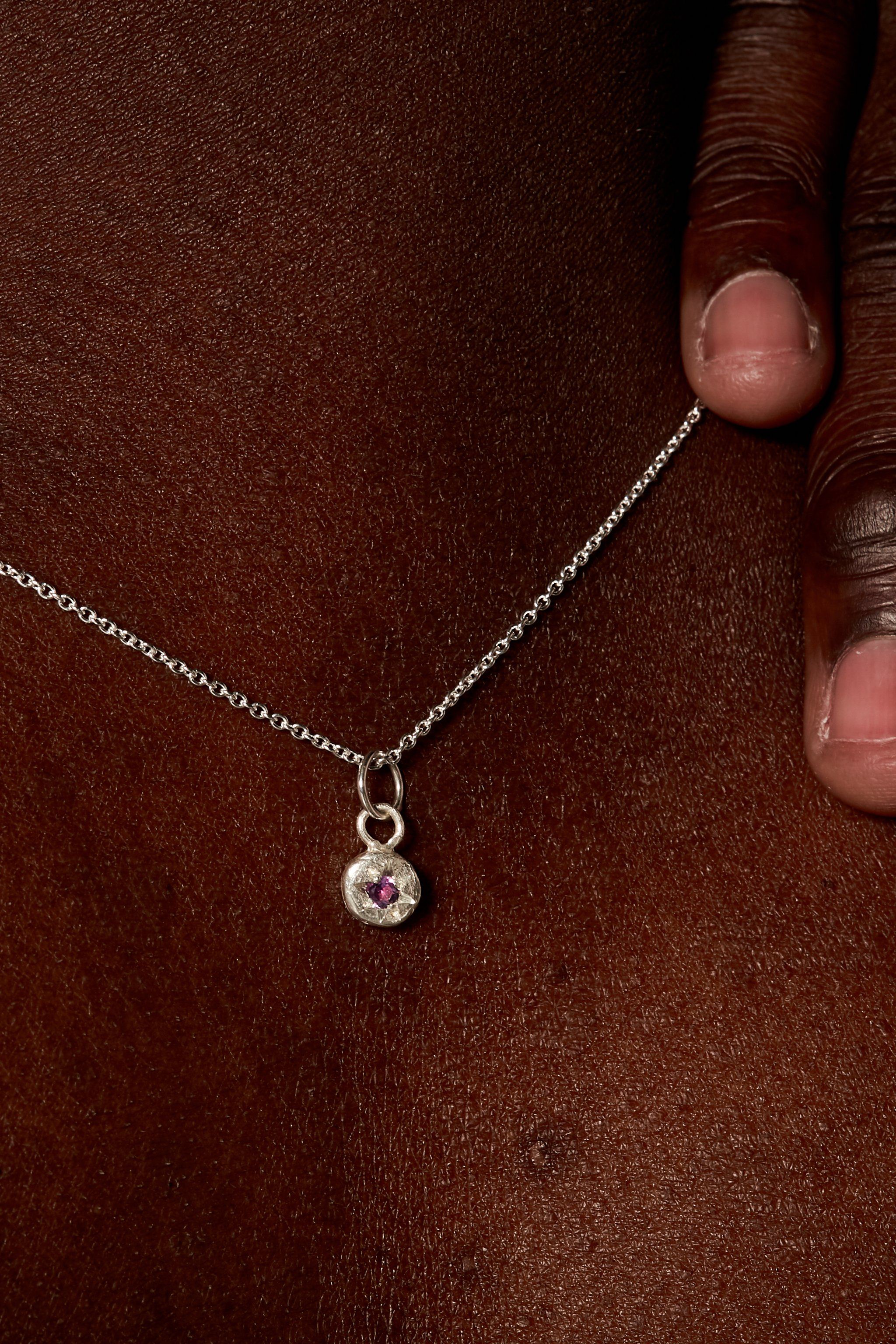 Sterling silver February birthstone necklace with star-set amethyst