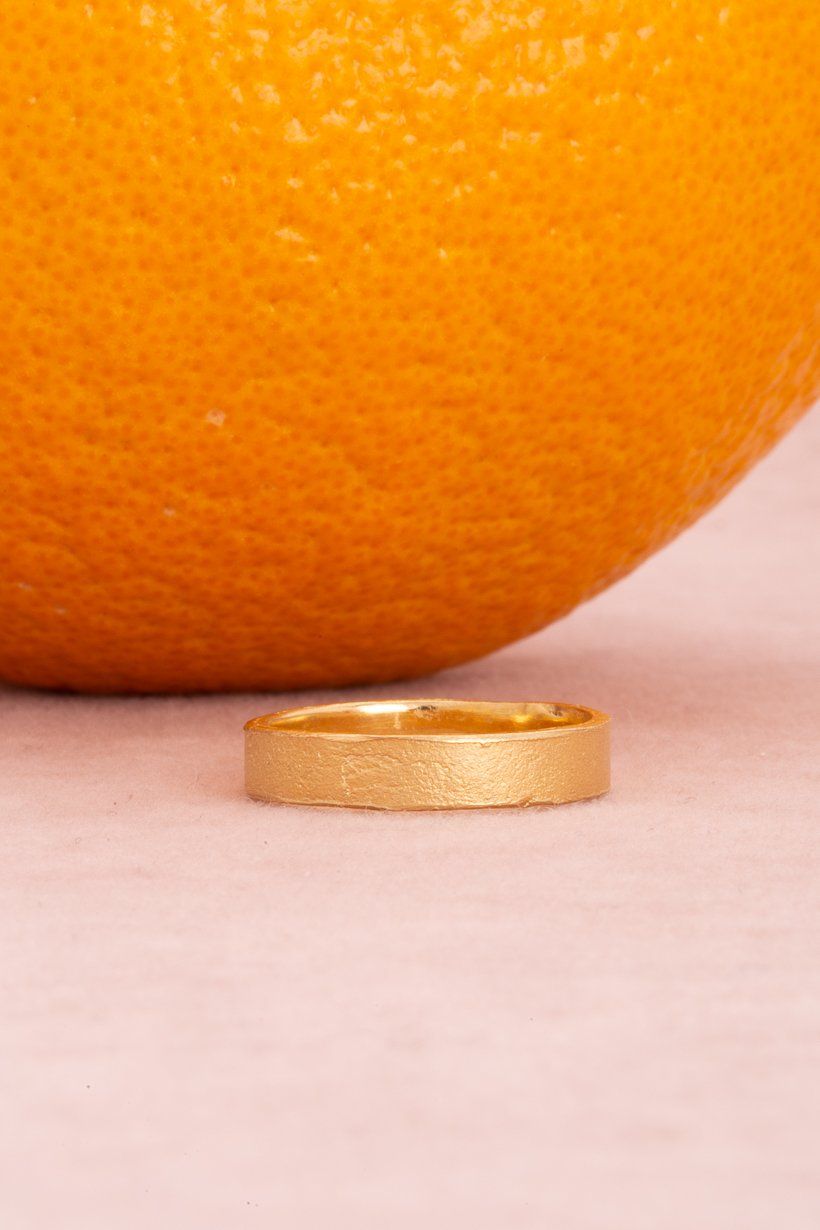 Citrus Ring in 18ct gold – wide gold mens wedding band with hand-textured citrus-inspired surface