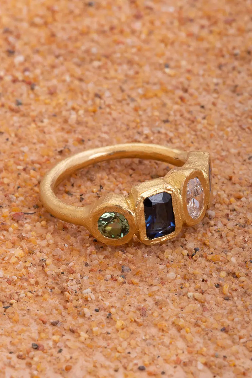 Side view of Posy Ring – colourful Australian sapphires and diamond clustered in textured recycled gold