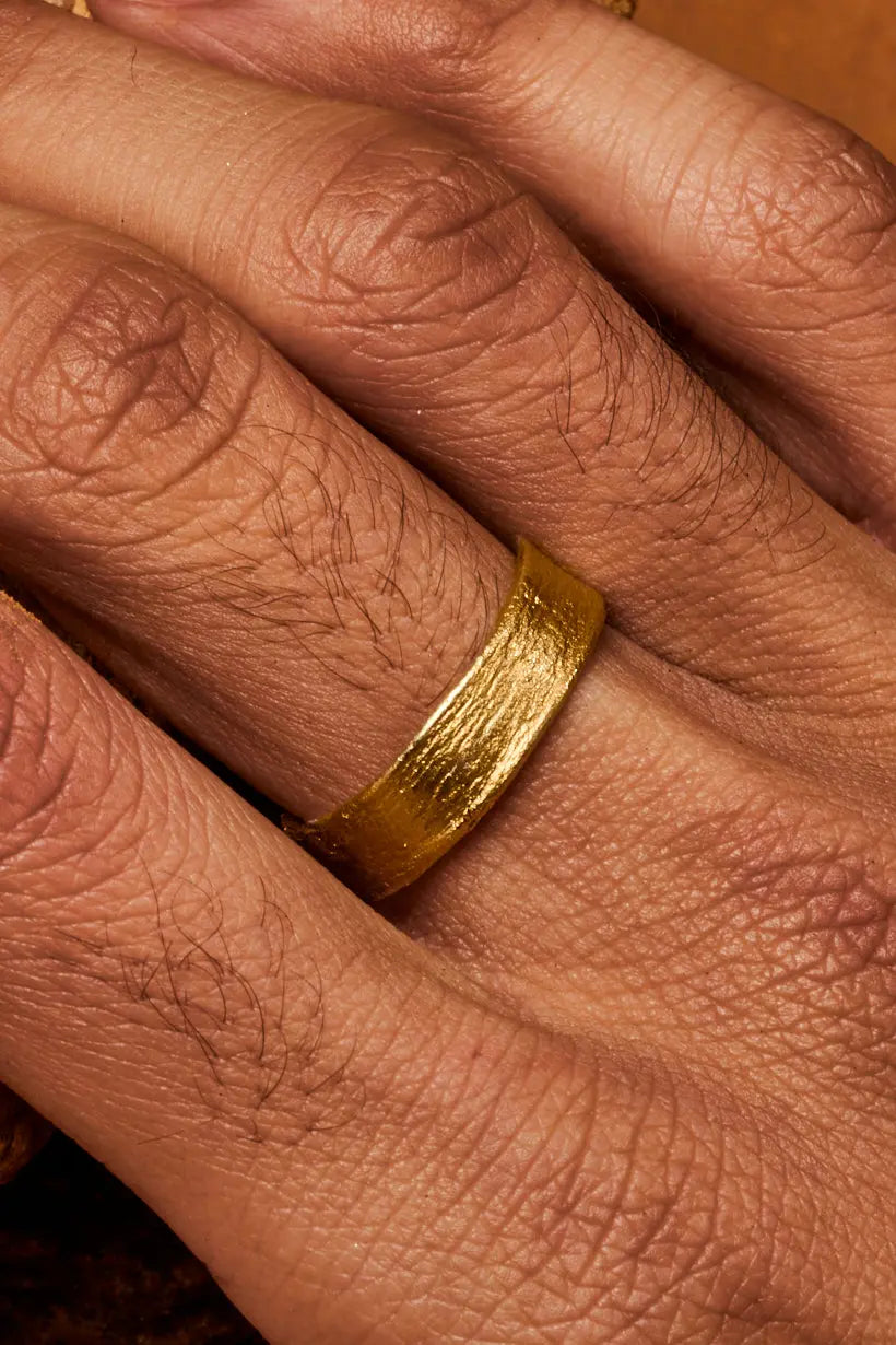 Textured recycled gold wedding band inspired by Protea bark