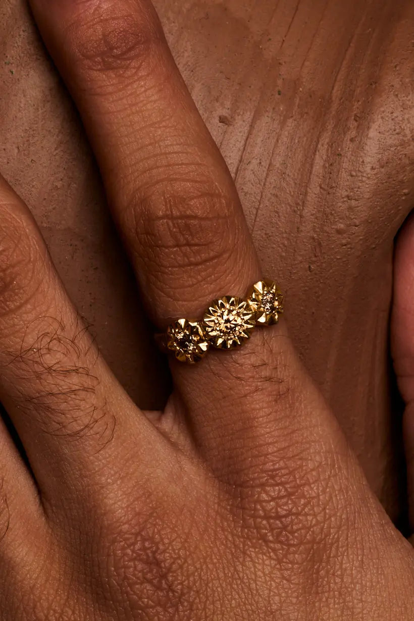 Handmade Sunflower Ring worn – botanical-style engagement or wedding ring in yellow gold