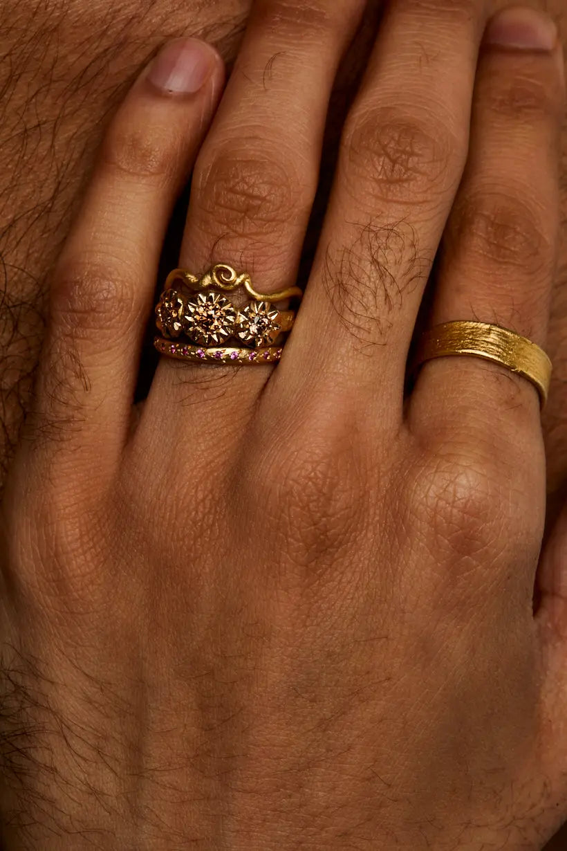 Tendril Ring stacked with sunflower ring and rosette ring, showing how it stacks.